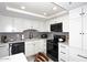Updated kitchen with sleek appliances, ample cabinetry, and contemporary finishes at 7950 E Camelback Rd # 308, Scottsdale, AZ 85251