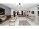 Inviting living room with an open floor plan, modern finishes, and seamless flow into the kitchen at 7950 E Camelback Rd # 308, Scottsdale, AZ 85251