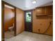 Mud room featuring tile flooring, a back door and a door to a half bath at 8637 E Appaloosa Trl, Scottsdale, AZ 85258
