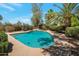 Refreshing pool surrounded by lush green foliage, providing a private retreat at 8637 E Appaloosa Trl, Scottsdale, AZ 85258
