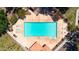 Aerial view of a pristine, rectangular swimming pool surrounded by lounge chairs at 921 W University Dr # 1023, Mesa, AZ 85201