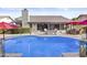 A refreshing pool with lounge chairs, patio furniture and an outdoor living space, perfect for summer relaxation at 9826 W Tonto Ln, Peoria, AZ 85382