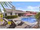 Inviting backyard pool with lounge chairs and patio, perfect for enjoying sunny days and outdoor relaxation at 9826 W Tonto Ln, Peoria, AZ 85382