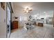 Bright dining area with a modern table set and direct access to the outdoor patio at 10832 W Piute Ave, Peoria, AZ 85373