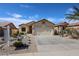 Inviting single-story home with a well-maintained desert landscape and a two-car garage at 10832 W Piute Ave, Peoria, AZ 85373