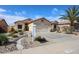 Welcoming home boasts low-maintenance desert landscaping and a convenient attached garage at 10832 W Piute Ave, Peoria, AZ 85373