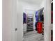 Organized walk-in closet featuring shelving, hanging racks, and ample storage space at 10832 W Piute Ave, Peoria, AZ 85373
