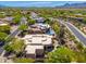 Desert community home with a uniquely shaped roof and a backyard pool and spa at 10901 E Quarry E Trl, Scottsdale, AZ 85262