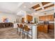 Eat-in kitchen with granite counters and adjacent dining area perfect for entertaining guests at 10901 E Quarry E Trl, Scottsdale, AZ 85262