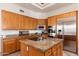 Open kitchen features granite countertops and stainless steel appliances for modern cooking at 10901 E Quarry E Trl, Scottsdale, AZ 85262