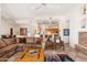 Bright and spacious living room featuring comfortable seating, a fireplace, and an open layout at 10901 E Quarry E Trl, Scottsdale, AZ 85262