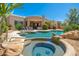Inviting backyard oasis featuring a sparkling pool and hot tub, perfect for relaxation and entertaining at 10901 E Quarry E Trl, Scottsdale, AZ 85262
