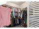A large, walk-in closet with shelving, clothing racks, and shoes, providing storage and organization at 11133 E Dragoon Ave, Mesa, AZ 85208