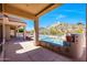 Gorgeous backyard with pool, spa, and custom tile accents for resort-style living at 11856 E Parkview Ln, Scottsdale, AZ 85255