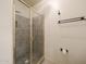 Tiled shower with glass enclosure in a well-lit bathroom at 11856 E Parkview Ln, Scottsdale, AZ 85255