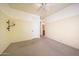 Bedroom featuring an ample floor space with a door to the Primary bathroom at 11856 E Parkview Ln, Scottsdale, AZ 85255