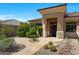 Charming home with desert landscaping and stone pathway at 11856 E Parkview Ln, Scottsdale, AZ 85255