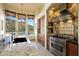 Kitchen includes granite countertops, stainless appliances, and view of pool at 11856 E Parkview Ln, Scottsdale, AZ 85255