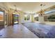 Inviting living room with decorative tile, chandelier, and a welcoming entrance at 11856 E Parkview Ln, Scottsdale, AZ 85255