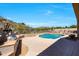 Inviting pool with built-in BBQ area, perfect for outdoor entertaining at 11856 E Parkview Ln, Scottsdale, AZ 85255