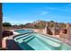 Relaxing pool and spa with scenic mountain backdrop at 11856 E Parkview Ln, Scottsdale, AZ 85255