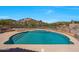 Sparkling pool features pristine blue water and offers stunning views of the surrounding desert landscape at 11856 E Parkview Ln, Scottsdale, AZ 85255