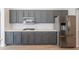 Stylish kitchen featuring modern cabinets, stainless steel appliances, and elegant countertops for a sleek design at 13305 W Colter St, Litchfield Park, AZ 85340