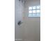 Showerhead and glass block window at 13305 W Colter St, Litchfield Park, AZ 85340