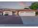 Charming single-story home with a well-maintained landscape and a spacious two-car garage at 13629 N 71St Dr, Peoria, AZ 85381
