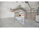 Spacious two car garage with epoxy flooring and automatic door to the neighborhood at 13629 N 71St Dr, Peoria, AZ 85381
