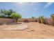 Large backyard with brick pavers and ample space, ideal for landscaping and recreation at 13706 N 130Th Ave, El Mirage, AZ 85335