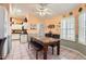 Dining area featuring bright walls, tile floors, and large windows at 14680 W Morning Star Trl, Surprise, AZ 85374