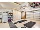 Well-organized garage with storage cabinets and ample space at 14680 W Morning Star Trl, Surprise, AZ 85374