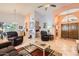 Bright living room showcasing high ceilings, tile floors, and an open floor plan at 14680 W Morning Star Trl, Surprise, AZ 85374