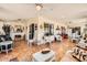 Large sun room with tile floors and multiple seating areas at 14680 W Morning Star Trl, Surprise, AZ 85374