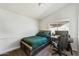 Well-lit bedroom featuring modern furnishings and a comfortable atmosphere for work or relaxation at 14821 N 42Nd St, Phoenix, AZ 85032