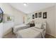 Cozy bedroom with two twin beds, perfect for guests or children, offering comfort and style at 14821 N 42Nd St, Phoenix, AZ 85032