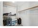 Functional walk-in closet with ample shelving and hanging space, providing organized storage solutions at 14821 N 42Nd St, Phoenix, AZ 85032