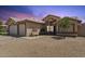 Charming single-story home with a neutral color palette, low maintenance yard, and convenient two-car garage at 14821 N 42Nd St, Phoenix, AZ 85032