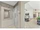 Inviting hallway leading to various rooms, featuring stylish decor and a seamless flow throughout the home at 14821 N 42Nd St, Phoenix, AZ 85032