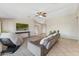 Inviting living room with tile flooring, ceiling fan, and comfortable seating at 14821 N 42Nd St, Phoenix, AZ 85032