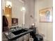 Stylish bathroom featuring a vessel sink, unique fixtures, and elegant decor at 15620 E Palomino Blvd, Fountain Hills, AZ 85268