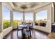 Bright breakfast nook surrounded by large windows with scenic views at 15620 E Palomino Blvd, Fountain Hills, AZ 85268