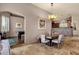 Elegant dining area with stylish chairs and view to the game room at 15620 E Palomino Blvd, Fountain Hills, AZ 85268
