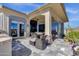 Inviting covered patio with comfortable seating and outdoor dining offers a relaxing and stylish outdoor living space at 15620 E Palomino Blvd, Fountain Hills, AZ 85268