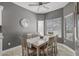Cozy dining room featuring tile floors, and a ceiling fan at 16232 W Montoya Dr, Surprise, AZ 85374