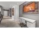 Bright hallway featuring a desk and contemporary artwork for a modern aesthetic at 16232 W Montoya Dr, Surprise, AZ 85374