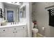 Bright bathroom with white cabinetry, modern fixtures, stone accents, and neutral decor at 16836 E Mirage Crossing Ct # B, Fountain Hills, AZ 85268