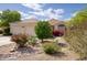 Charming single-story home with desert landscaping and colorful flowering bushes at 16836 E Mirage Crossing Ct # B, Fountain Hills, AZ 85268