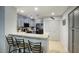 Modern kitchen featuring granite countertops, stainless steel appliances, and a breakfast bar at 16836 E Mirage Crossing Ct # B, Fountain Hills, AZ 85268